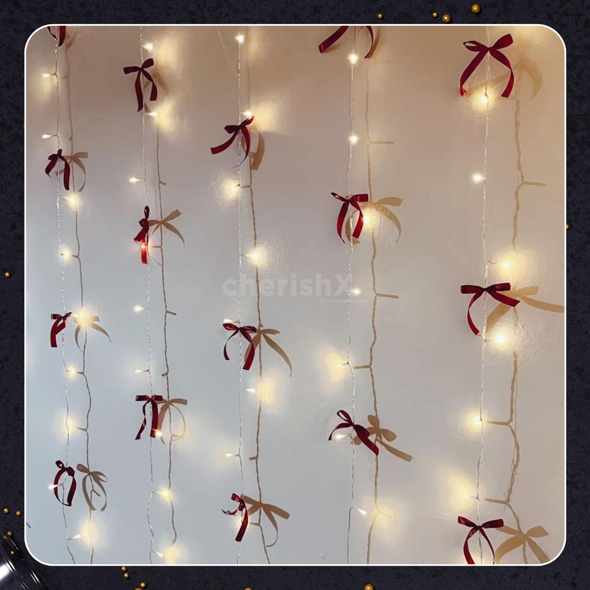 Wall decor with fairy lights and handmade bows