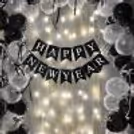 Happy New Year, Black and White bunting complements the decor without a colour break.
