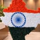 Tricolour marigold flowers on the map cutout make the photo booth beautifully patriotic.