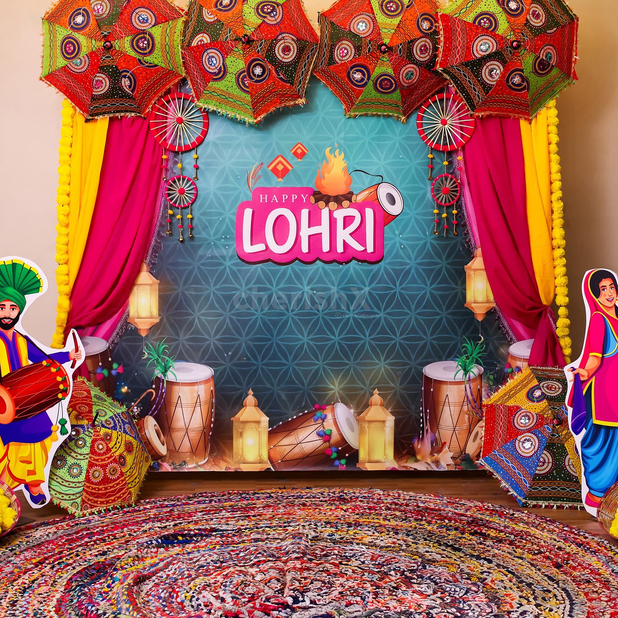 Yellow and pink fabrics are eye-catching hues around the Lohri banner on the stand.
