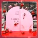 Soft blush and romantic photobooth backdrop designed for memorable Valentine snapshots.