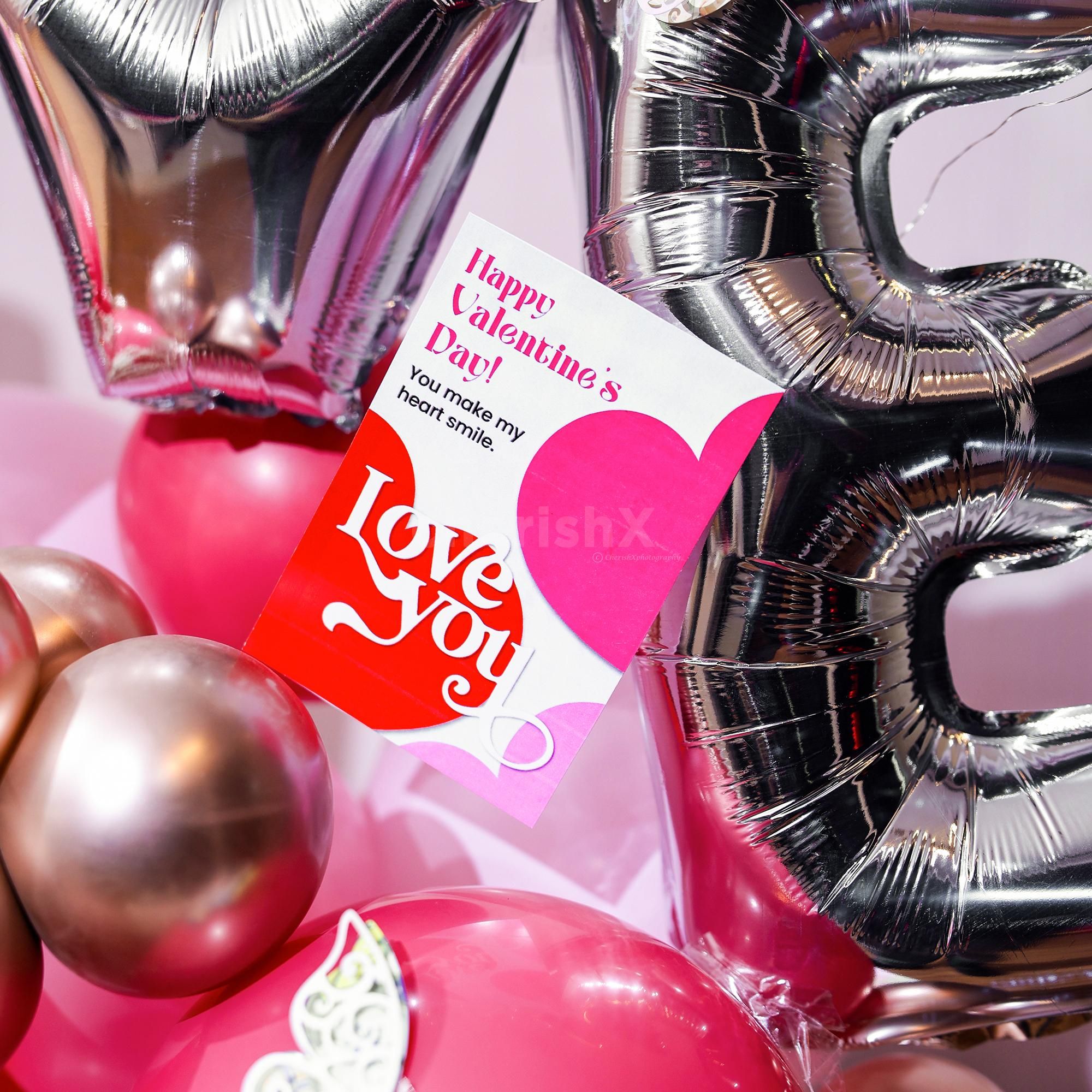 Bunches of baby's breath add a natural touch to the balloon shapes.