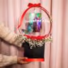The bubble balloon is stuffed with a real picture of the couple to make it a personalised gift.
