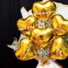 Korean white paper with a golden border wraps the bunches for an excellent look.