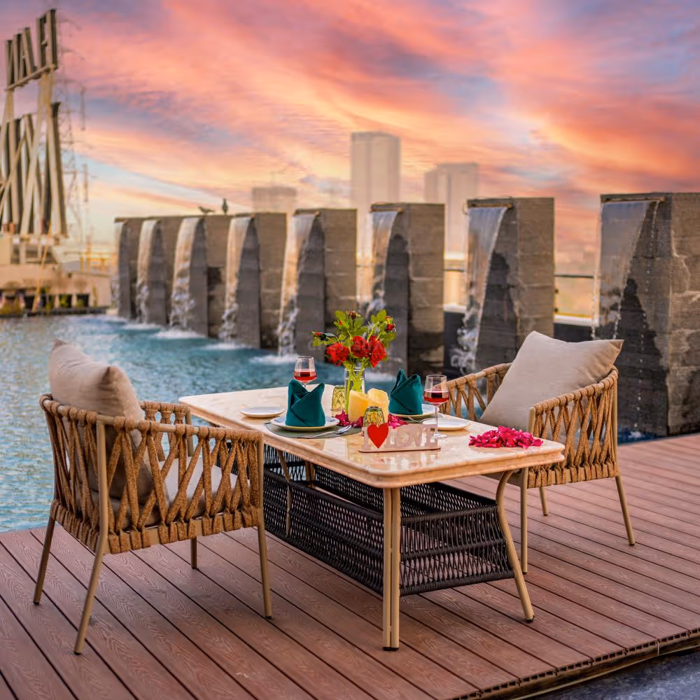 Poolside candlelight dinner setup for Valentine’s Day at Ramada Encore, Dwarka Expressway