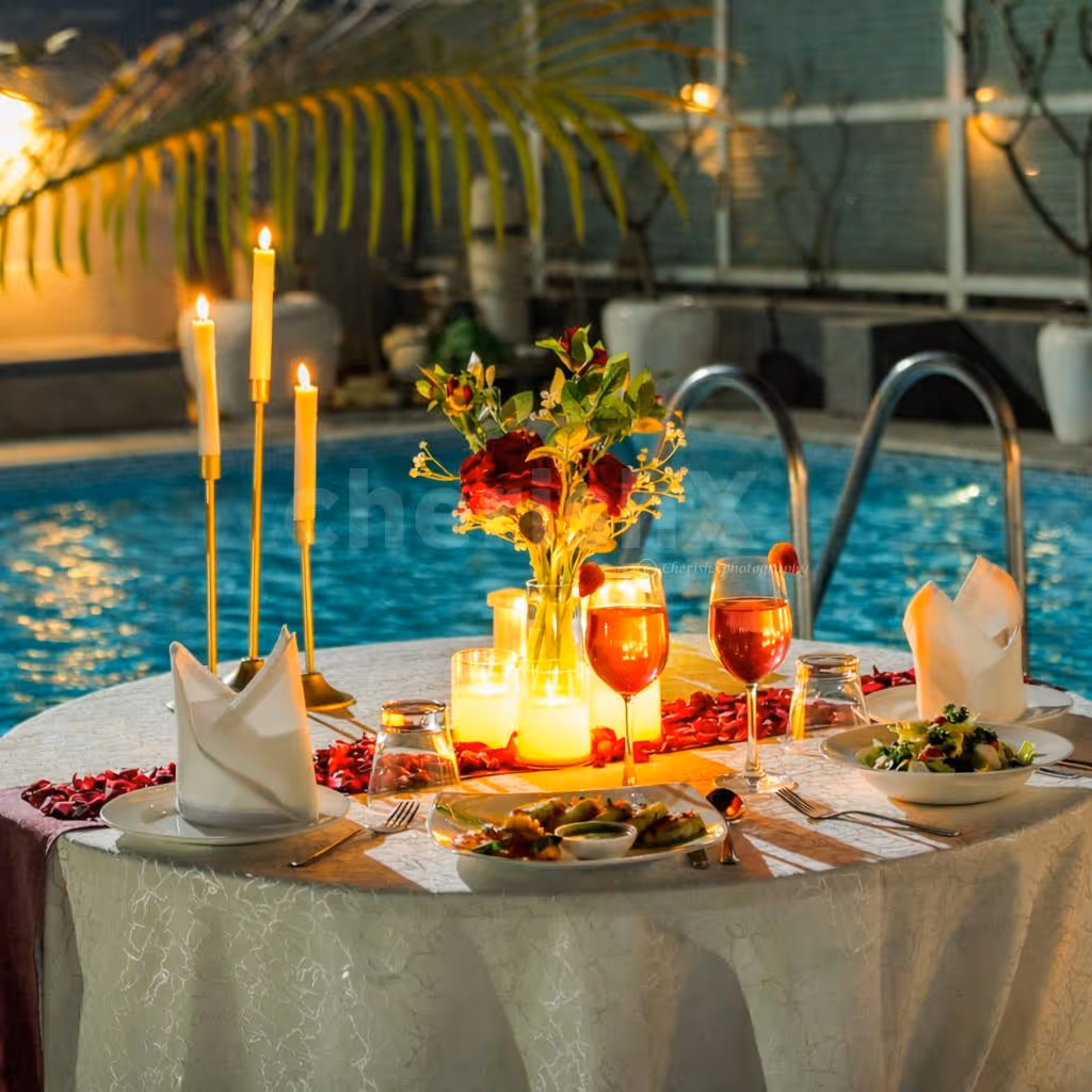 Valentine’s Day poolside candlelight dinner setup at Country Inn