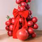 The paper cake table breaks the monotony of the red tone and adds vibrancy
