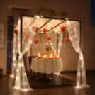 Cabana poolside candlelight dining setup at SkyClub rooftop