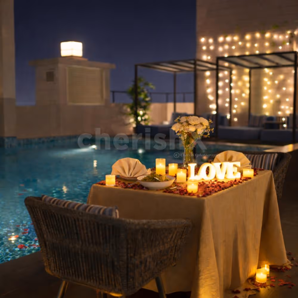 private candlelight dining experience with serene pool views