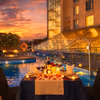 Romantic Valentine’s poolside candlelight dinner setup at Radisson Greater Noida