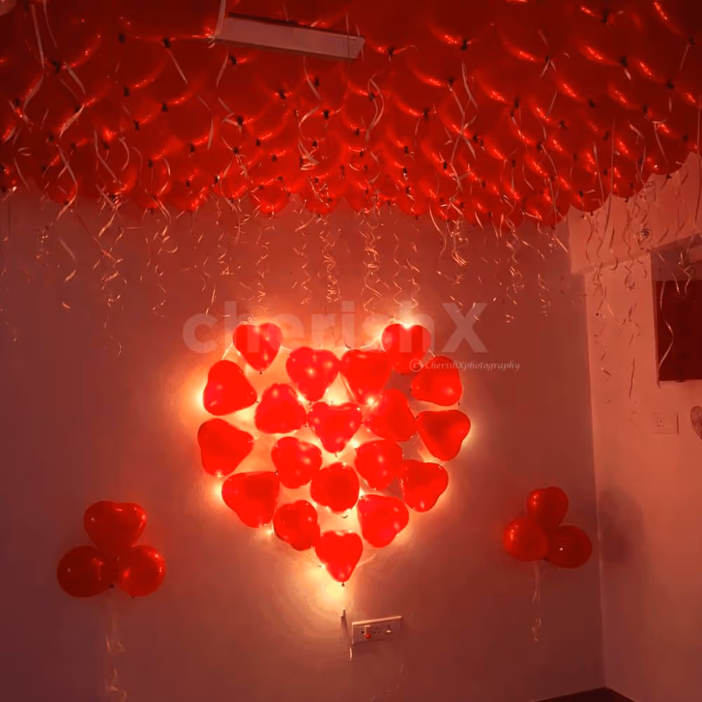 glowing red heart decor with balloons