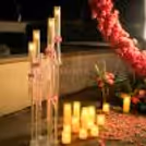 Differently sized LED candles lit the pathway to stand and add romance in the air