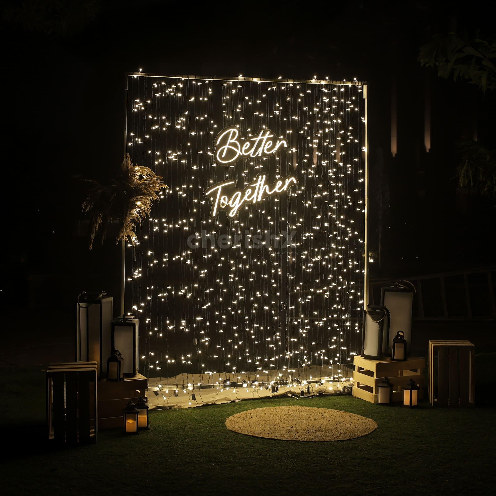 Fairy light backdrop of massive size ensures the romance sparkles throughout the night