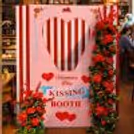 Valentine couple kissing booth