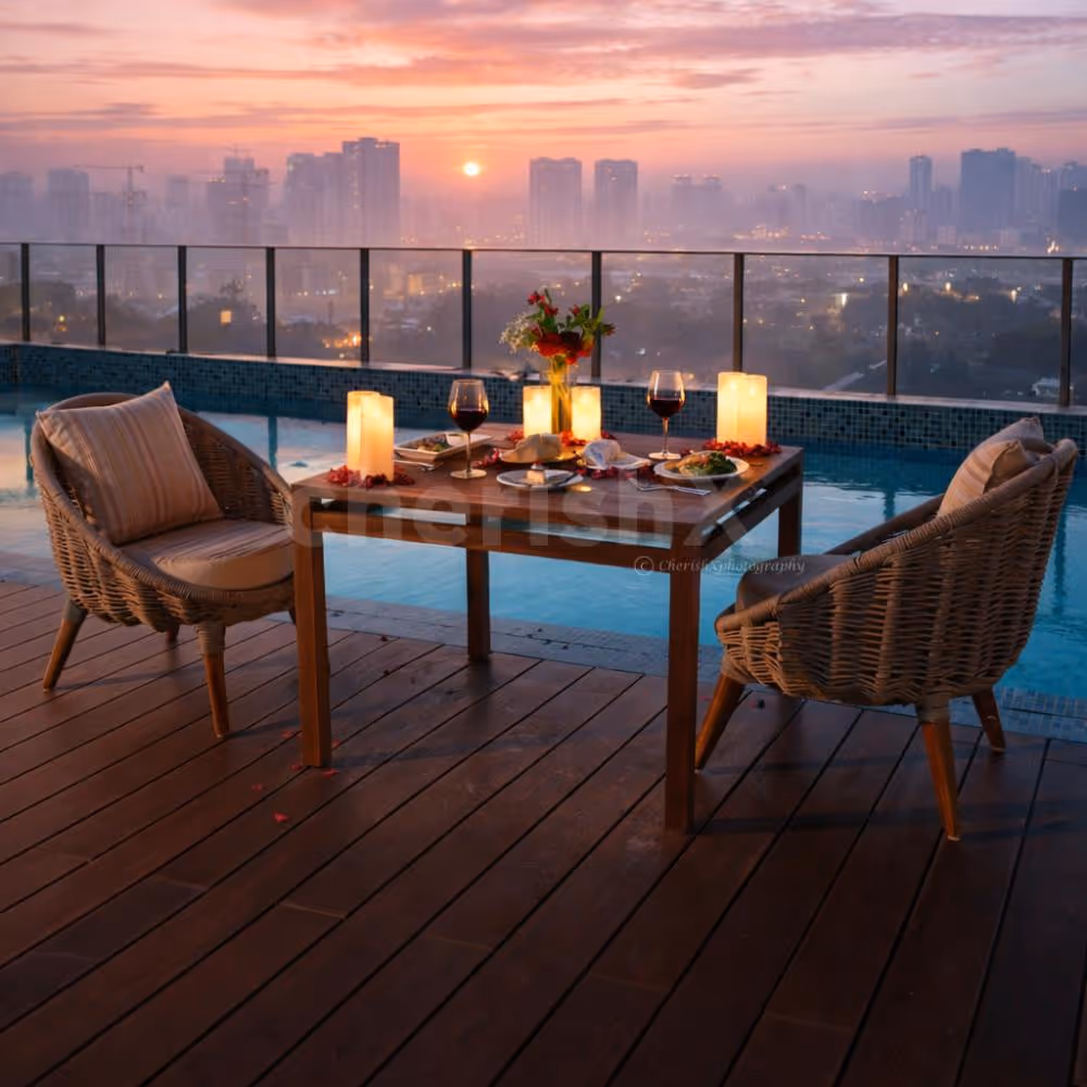 romantic poolside rooftop candlelight dinner setup at iris sarovar portico gurgaon