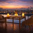 romantic rooftop poolside valentine celebration with wine and candles
