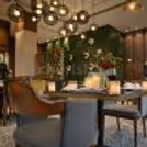 romantic indoor valentine table with candles and soft lighting