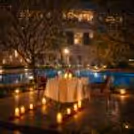 Pool view garden candlelight dinner under the open sky
