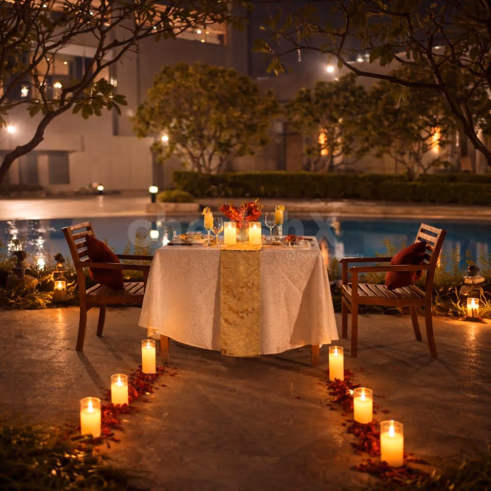 Romantic open-air dining with LED candles and rose petals