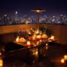 Alfresco candlelight dining at Rhythm Hotel with panoramic Gurgaon views