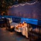 Couple dining at the poolside candlelight dinner on Valentine’s Day