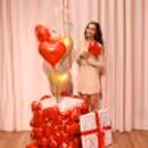 Gold heart balloons add a soft, premium glow to the setup overall