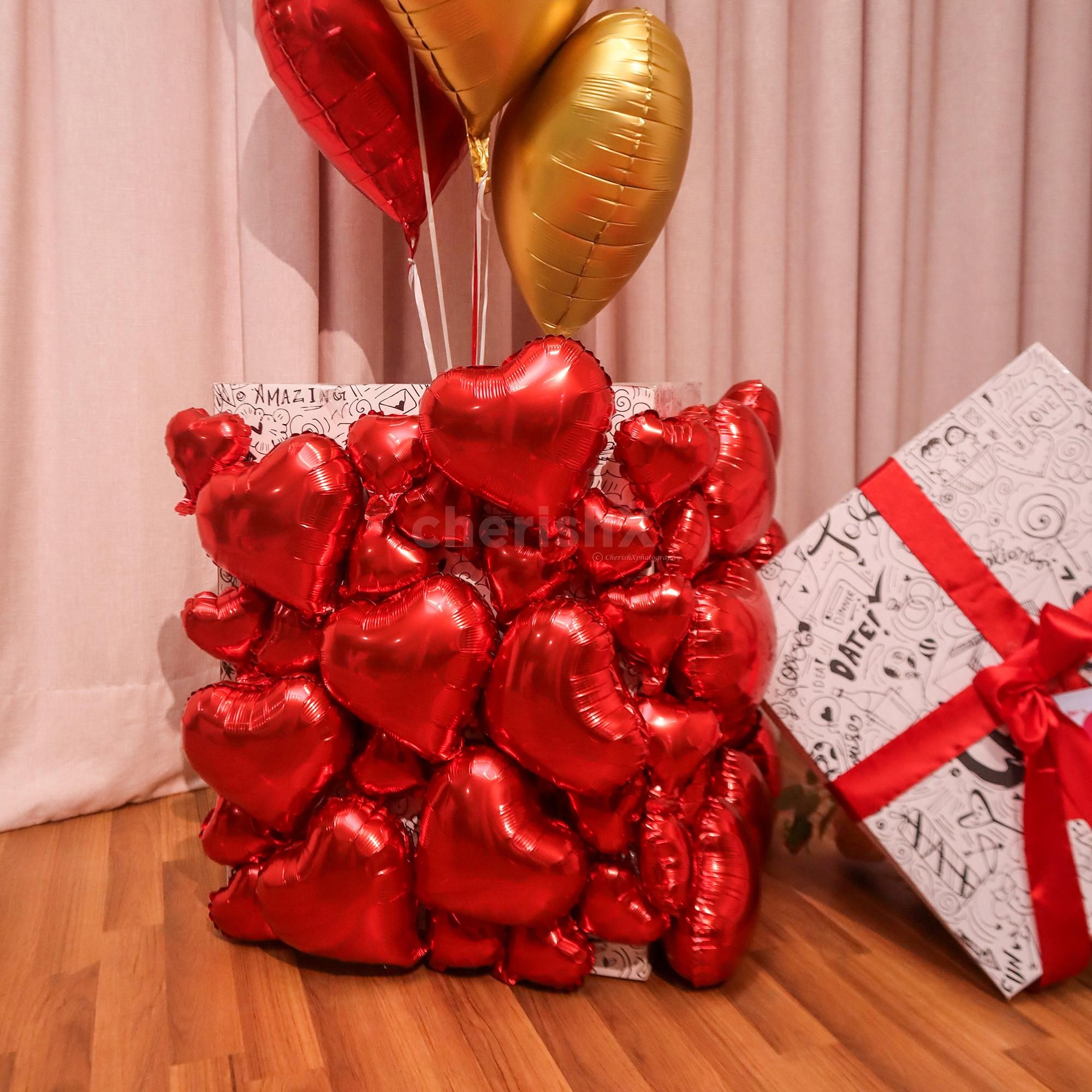 Floating balloons rise gracefully to reveal a beautiful love surprise