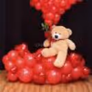 Handmade red ribbon bow adds elegance to the balloon arch and convey gratitude