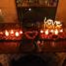 beautifully decorated table with candles for a romantic meal