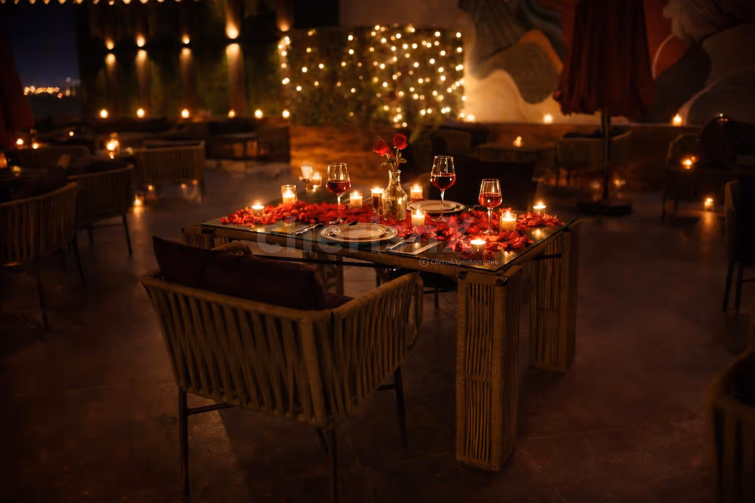 couple enjoying a romantic rooftop dinner under the open sky