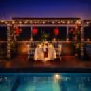 A romantic poolside table set for an unforgettable Valentine evening at Hyatt Centric MG Road Bangalore
