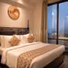 Rooftop alfresco dining with breathtaking city views at The Rhythm Hotel