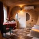 cozy cave-inspired interiors designed for couples