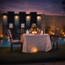Romantic poolside candlelight table setup at Park Plaza Gurgaon