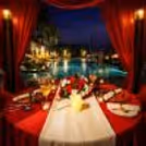 An intimate evening awaits under the glow of candles at this stunning poolside cabana at Crowne Plaza Mayur Vihar.