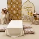 White and pink roses add freshness to the Eid décor setup.