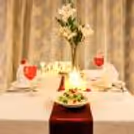 Experience the love in the air by booking CherishX's Romantic Candle Light Dinner at the Country Inn, Gurgaon.