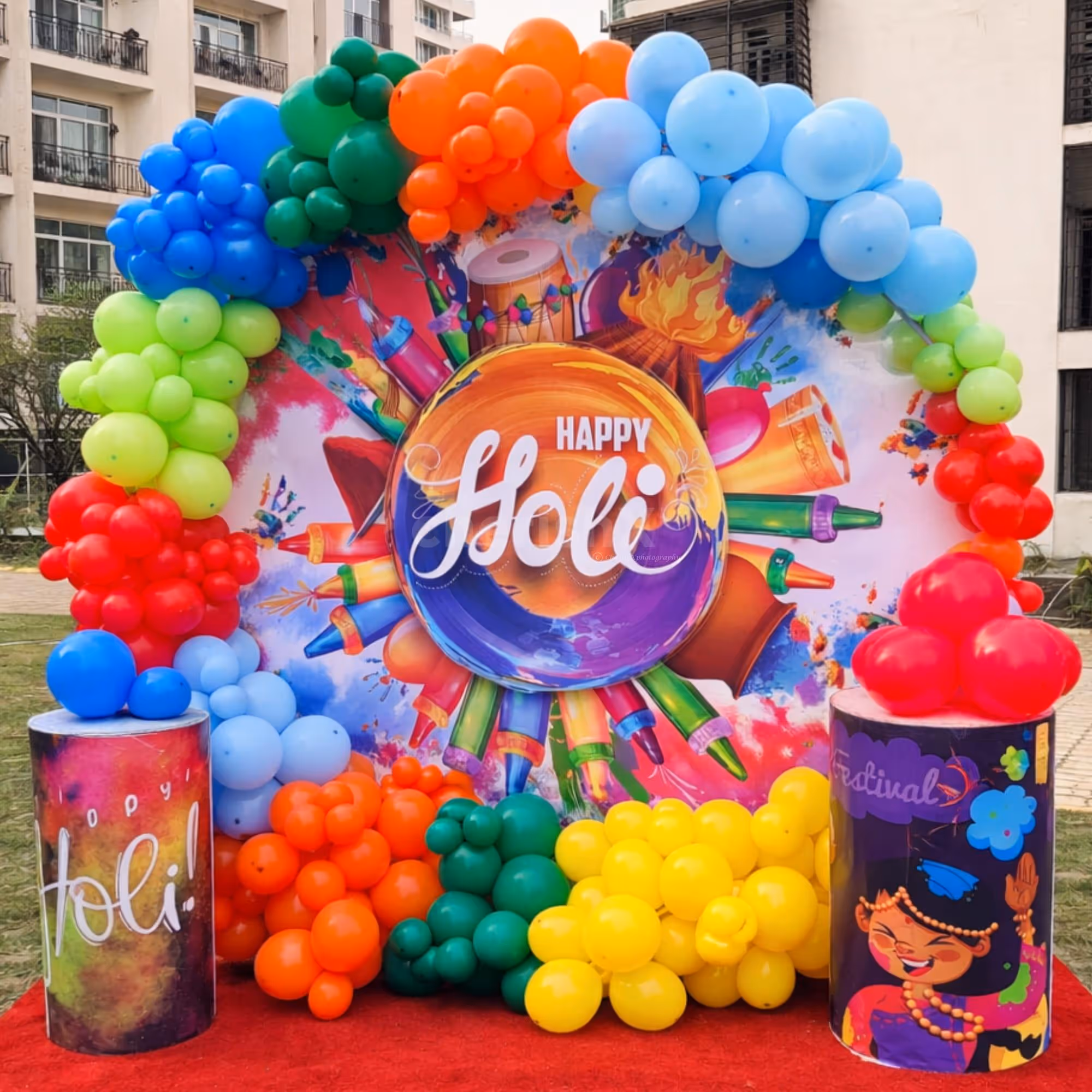 A ring stand with a 6 x 6 flex banner makes a perfect backdrop for a Holi celebration.