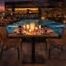 The beautiful surroundings guarded by the blue waters of the pool make this diner even more romantic