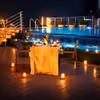Romantic evenings by the poolside at Regenta with a candlelight dinner."