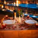Create cherished memories with our poolside candlelight dinner experience.