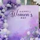Chrome and metallic purple balloons in the arch add a powerful grace to the decor