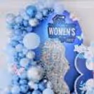 Delicate paper butterflies in the decor symbolize the spirit of freedom to empower women