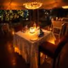 Soft candlelight, elegant table décor, and romantic ambiance set the tone for an unforgettable cabana dining experience.