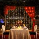 red proposal decor with roses and romantic vibes