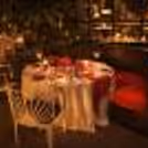 An enchanting alfresco candlelight dinner at Hilton Manyata Tech Park, where soft lights and open skies set the perfect romantic mood.
