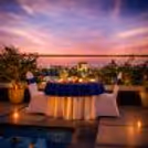 Experience intimate moments with your partner at this rooftop poolside candlelight dining at Clarion Hotel Bangalore, surrounded by soft lights and serene views.