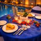 Indulge in an elegant rooftop poolside candlelight dining experience at Clarion Hotel Bangalore with beautiful ambiance and romantic vibes.