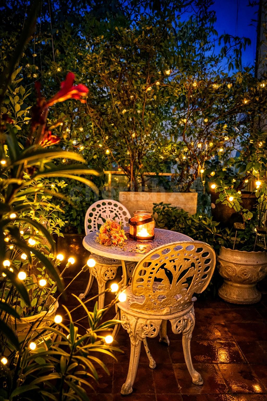 A cozy candlelight escape tucked in a lush garden, where every glow feels magical