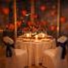 Enjoy a luxurious candlelight dinner with soft lighting, floral décor and heart balloons at Holiday Inn Bangalore.